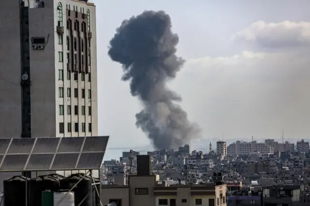 Smoke rises in northern Gaza after an Israeli air strike. Photo: 20 May 2021