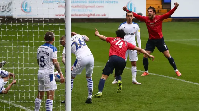 Nathaniel Knight-Percival celebrates