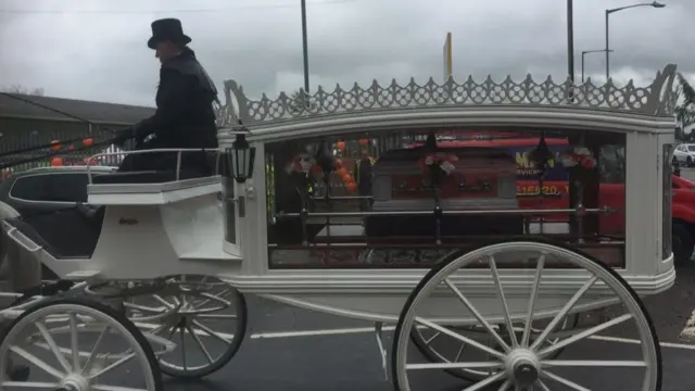 The carriage carrying the coffin