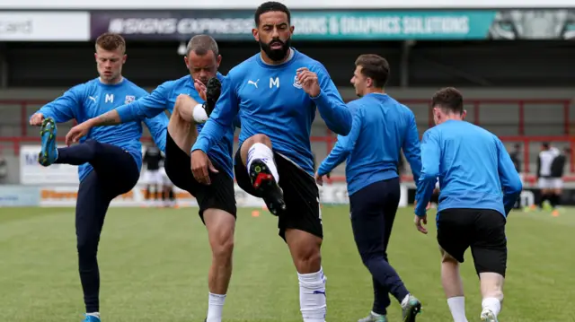 Tranmere's players warm up