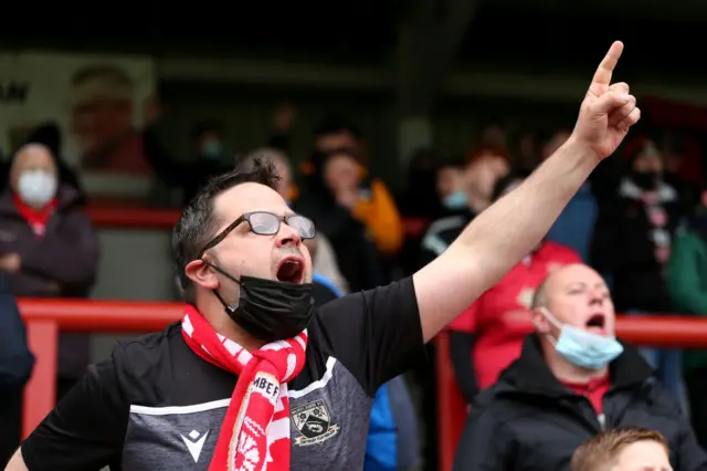 Morecambe fans welcome their team