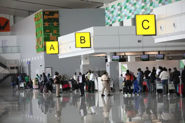 Passengers at the Nnamdi Azikiwe International Airport, in Abuja.