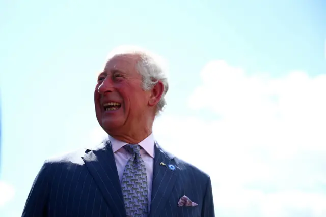 The Prince of Wales walks by the Coventry Canal.