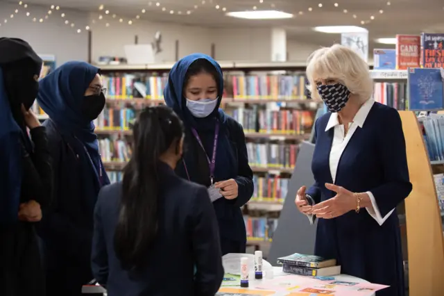 The Duchess of Cornwall meets pupils from Eden Girls School during her visit to Coventry Central Library