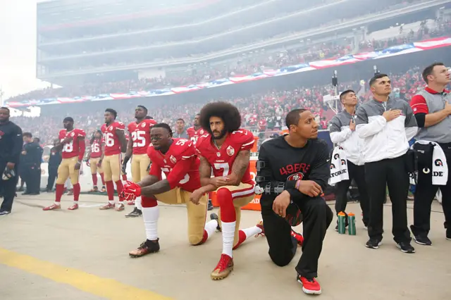 Quarterback Colin Kaepernick started kneeling during the US national anthem to protest racial inequity in 2016