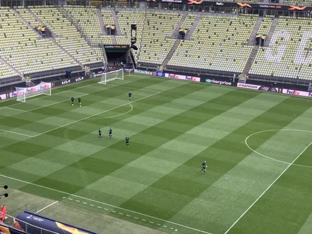 Match officials warming up in the stadium the day before the 2021 Europa League final