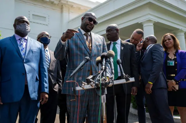 George Floyds brother Philonise Floyd speaks with other family members and lawyers outside the White House after meeting with US President Joe Biden in Washington, DC, on May 25, 2021.