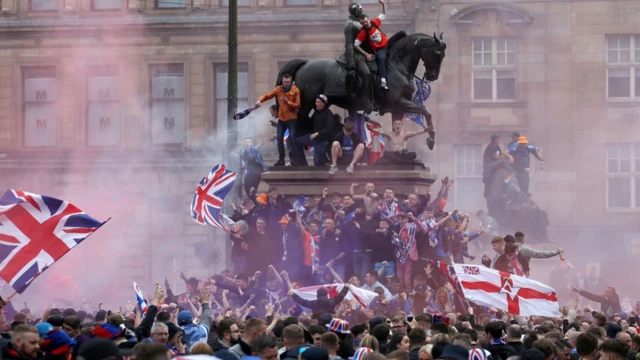 Thousands of fans marched to George Square after Rangers were presented with the Scottish Premiership trophy on 15 May