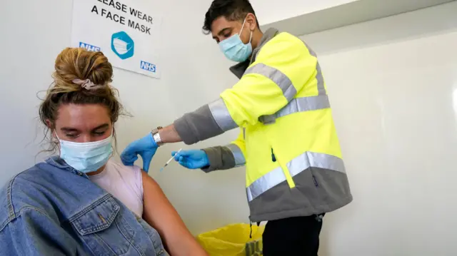 Rachel Turner receives her Covid-19 vaccination at the Penny Street vaccination centre in Blackburn as the spread of the Indian coronavirus variant could lead to the return of local lockdowns, ministers have acknowledged. Bolton, Blackburn with Darwen and Bedford are the areas ministers are most concerned about.