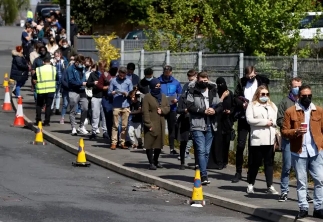 Long queues for a mobile vaccination unit in Bolton last week