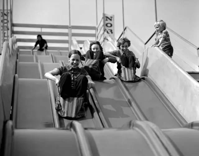 Children enjoying a fun fair