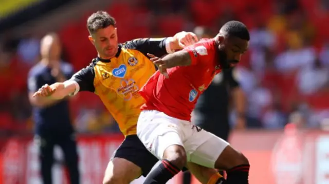 Yann Songo'o shields the ball