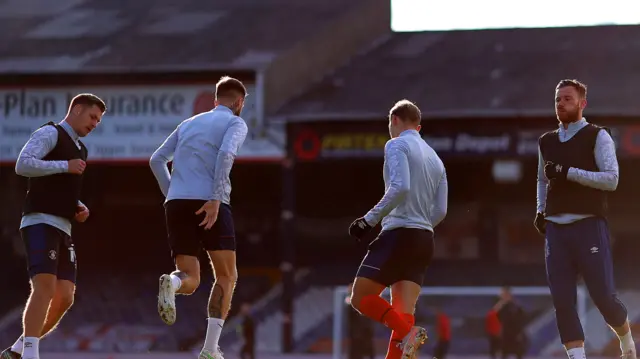 Luton players warm up