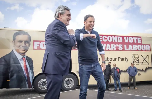 Scottish Labour leader Anas Sarwar (right) with former prime minister Gordon Brown at a drive-in rally in Glasgow on Wednesday