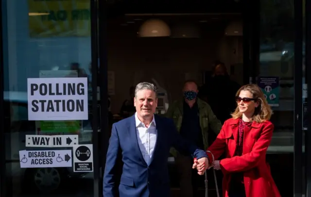 Sir Keir Starmer and his wife vote in north London