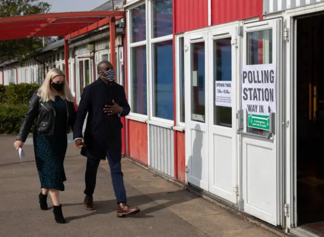 Shaun Bailey and wife at polling station