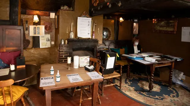 A ballot box on a pub table