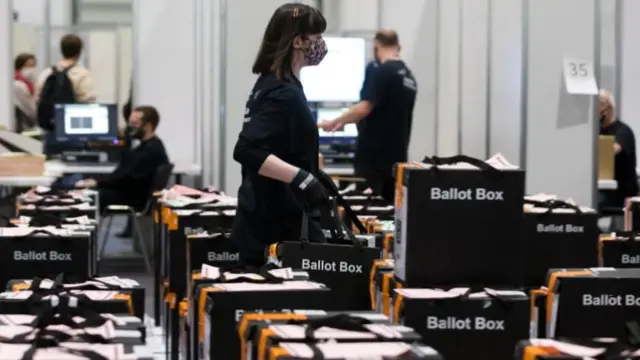 Count staff working at the election count at the ExCel Centre in London