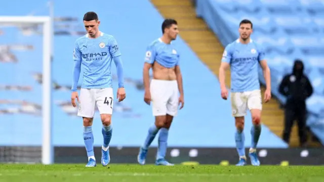 Man City players look dejected