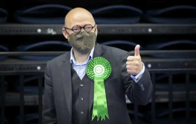 Scottish Greens co-leader Patrick Harvie gives a thumbs-up at the Glasgow count