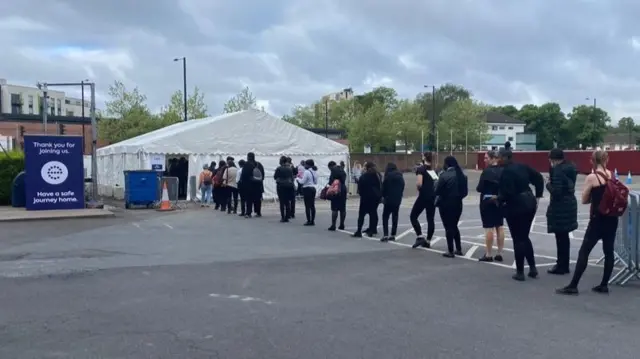 Stadium staff queuing to start work