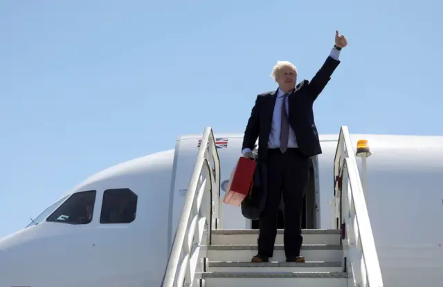 Prime Minister Boris Johnson boards the plane for Newquay Airport ahead of Friday's G7 summit.