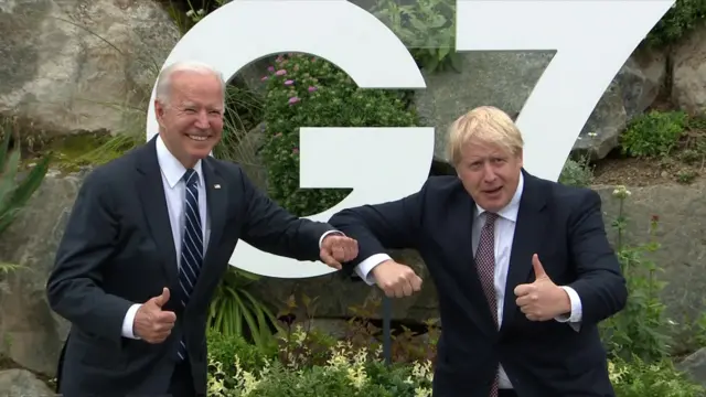 US President Jo Biden and UK Prime Minister Boris Johnson greet each other in Cornwall