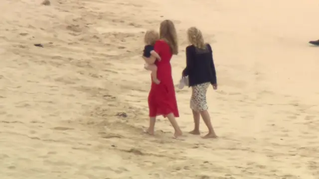 Jill Biden and Carrie Johnson took a bare foot stroll on beach with little Wilfred