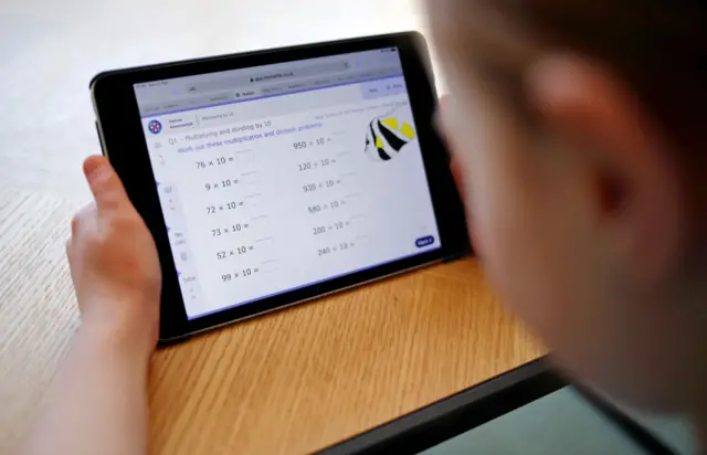 Generic image of child learning at an iPad