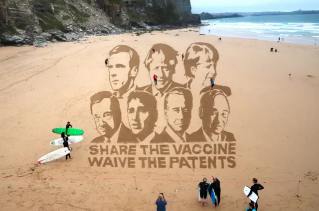 Undated handout photo of a large image of world leaders created on a Cornwall beach to demand further donations of Covid-19 vaccines to countries around the world (issued 11 June 2021)