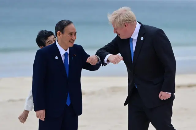 Boris Johnson meeting Japan's Prime Minister Yoshihide Suga