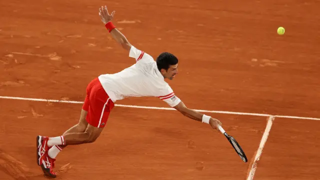 Djokovic stretches