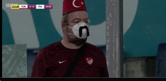 Turkish fan with moustache on mask