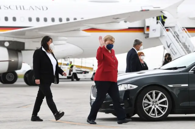 Angela Merkel arrives