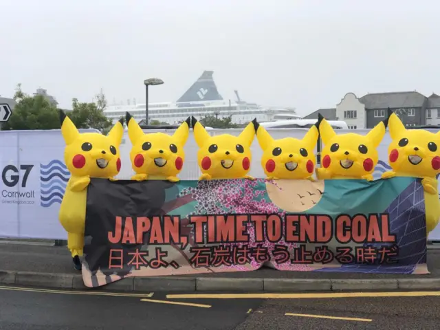 Protesters in Pikachu costumes