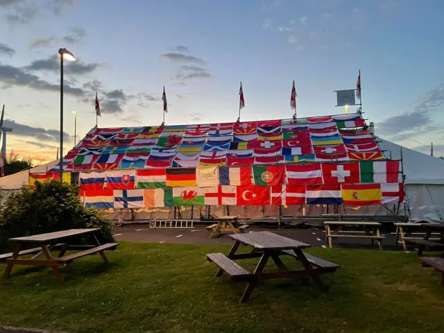 Marquee decked with flags