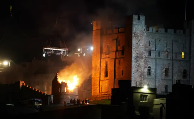 Fire with lighting gantry ovehead at Bamburgh Castle