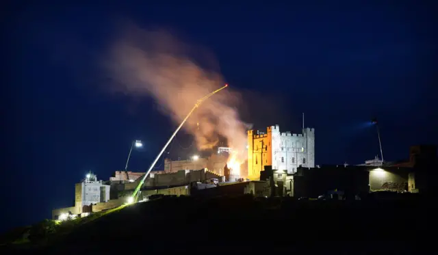 Crane over Bamburgh Castle