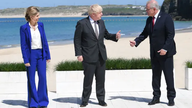 Prime Minister Boris Johnson (centre), alongside his wife Carrie, and Australian Prime Minister Scott Morrison, during the G7 summit in Cornwall.