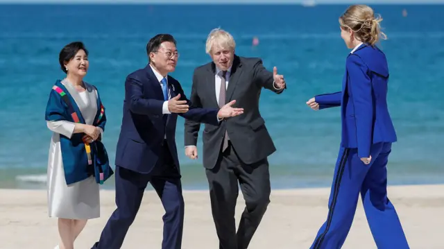 Prime Minister Boris Johnson and his wife Carrie, greet South Korea"s President Moon Jae-in and South Korea"s first lady Kim Jung-sook, during the G7 summit in Cornwall.