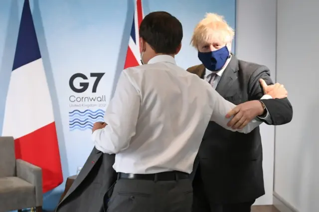 Prime Minister Boris Johnson and France's President Emmanuel Macron attend a bilateral meeting during G7 summit in Carbis Bay, Cornwall,