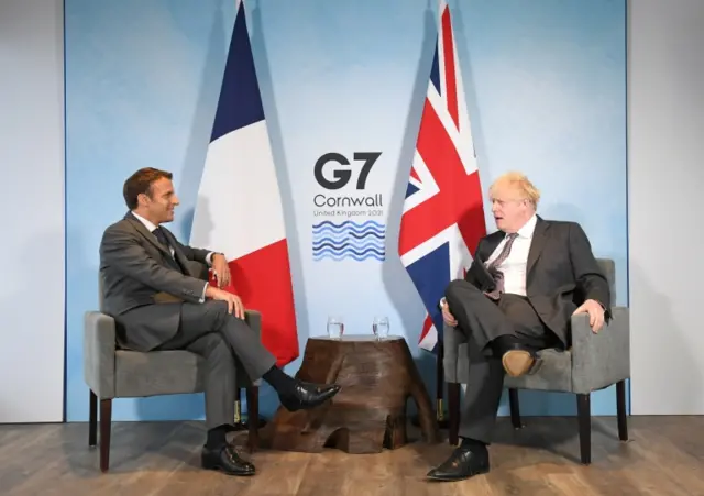 UK Prime Minister Boris Johnson and France's President Emmanuel Macron attend a bilateral meeting during G7 summit in Carbis Bay