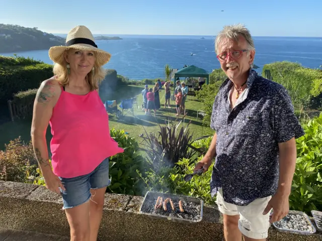 Ruthie and Tony Goff with a barbecue