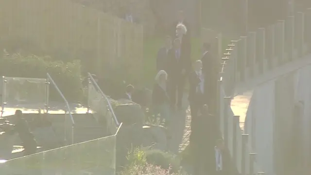 G7 leaders and guests make their way to the beach barbecue at Carbis Bay