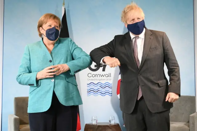 Boris Johnson and German Chancellor Angela Merkel