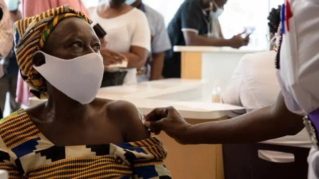 A woman is vaccinated in Ghana, which has received jabs via the Covax scheme