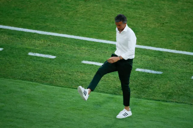 Luis Enrique kicking the turf in frustration