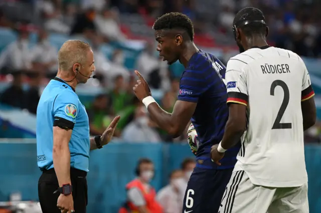 Paul Pogba talking to the referee