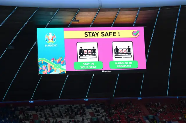 The LED screen displays a Coronavirus stay safe and social distancing message