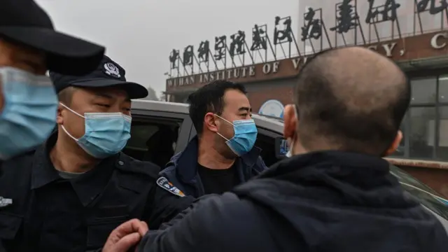 Police outside the Wuhan Institute of Virology